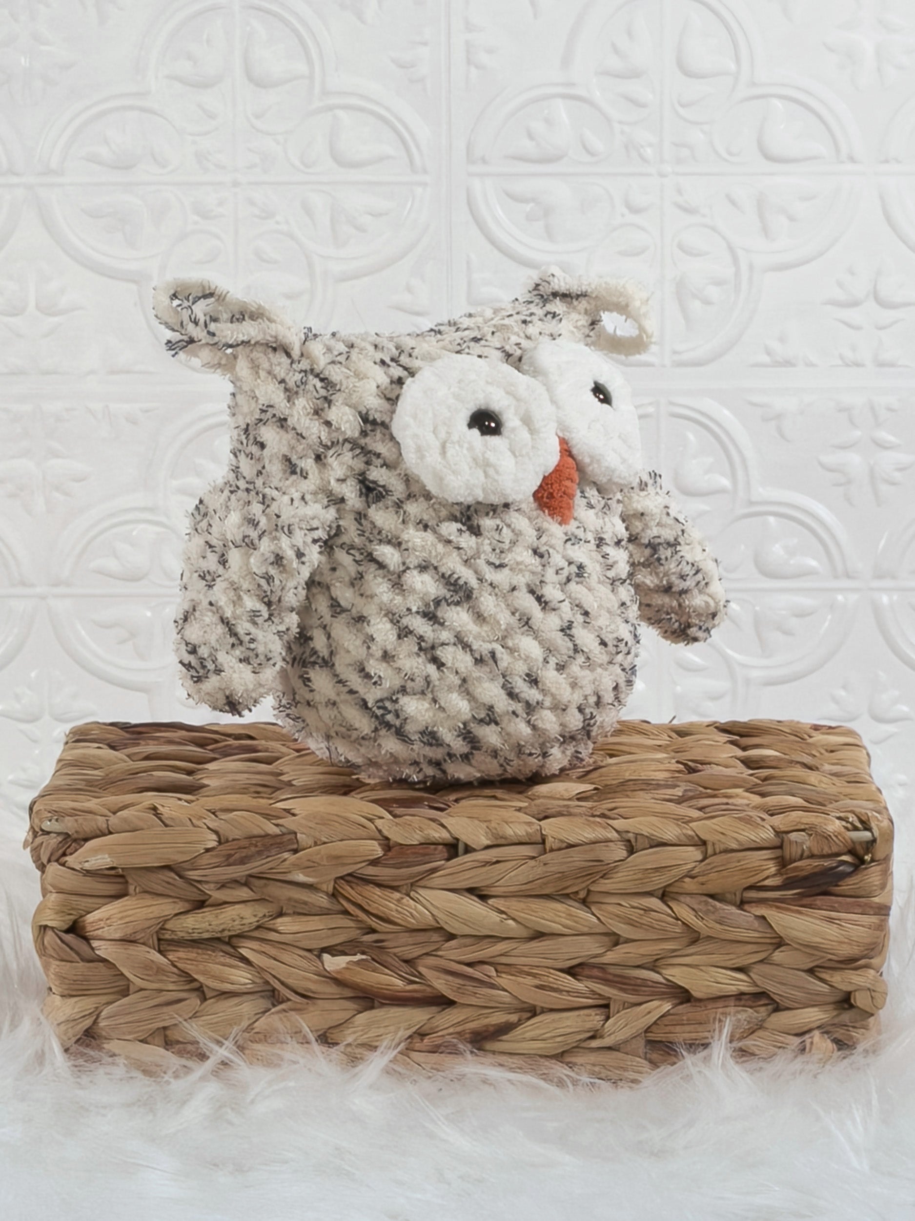 Handmade tweed owl crochet plushie shown from the side