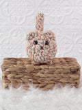 Handmade loaf cat crochet plushie with a rounded bread-loaf shape