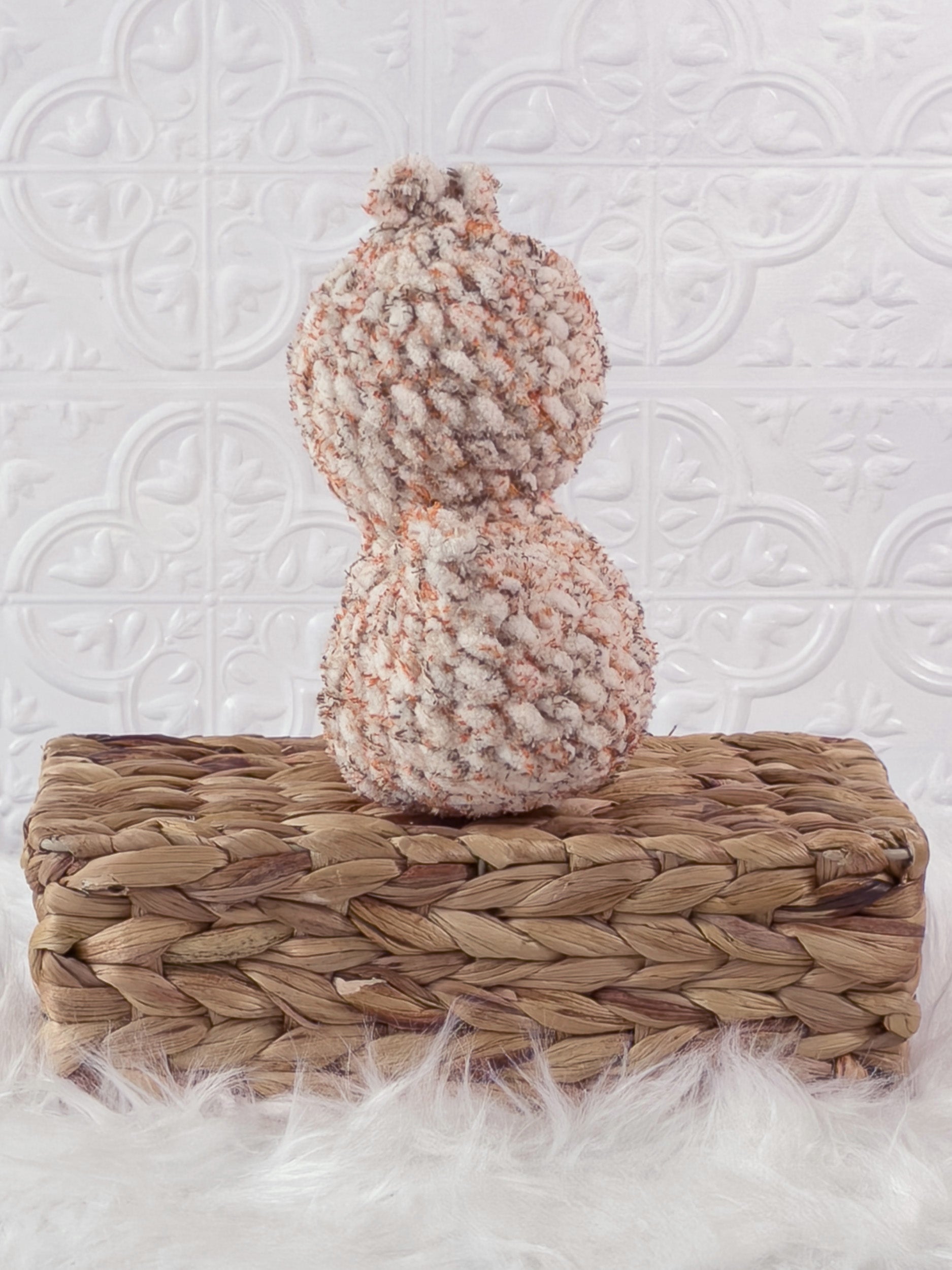 Handmade tweed, orange rubber duck crochet plushie shown from the back