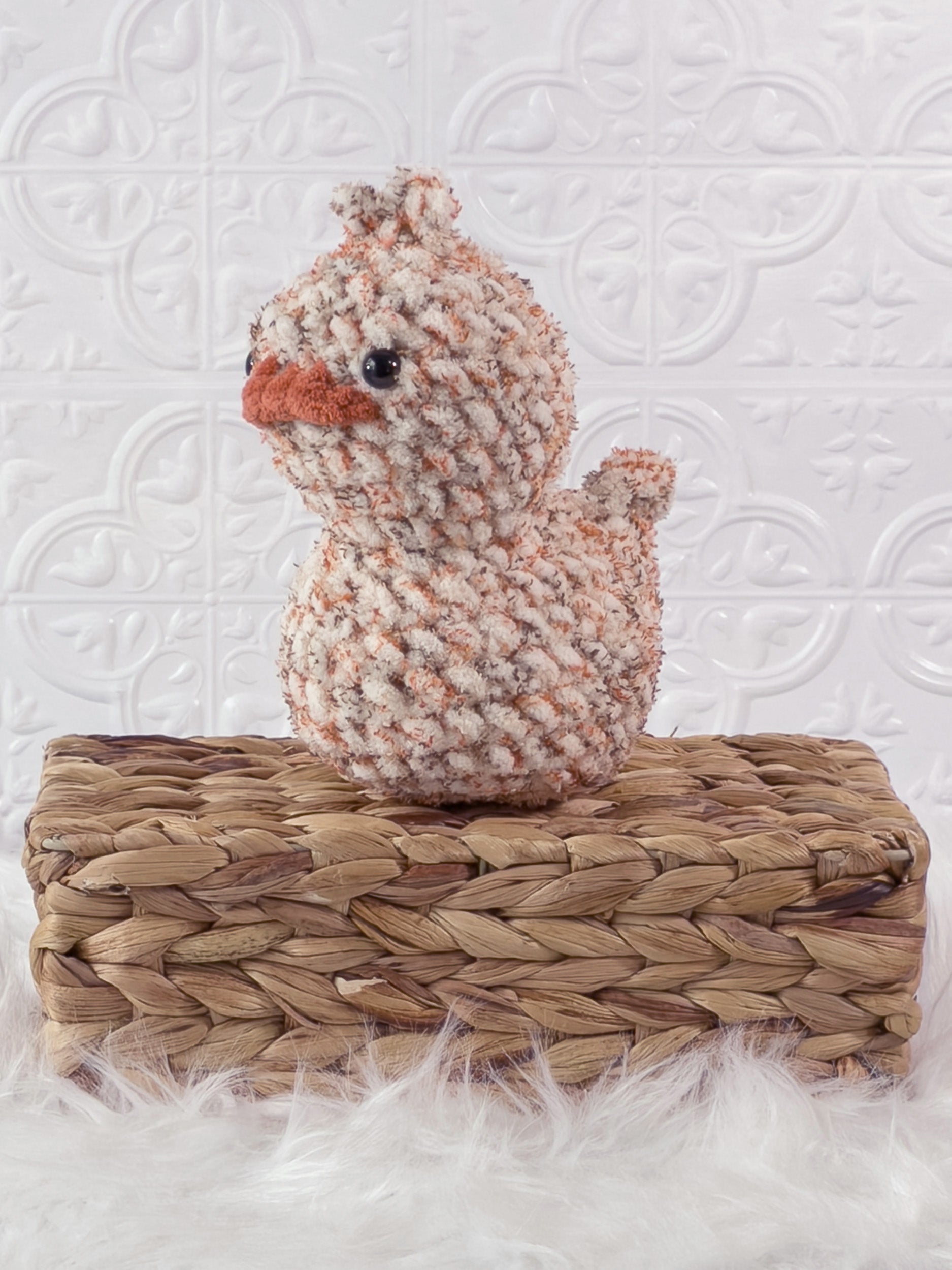 Handmade rubber duck crochet plushie shown from the front