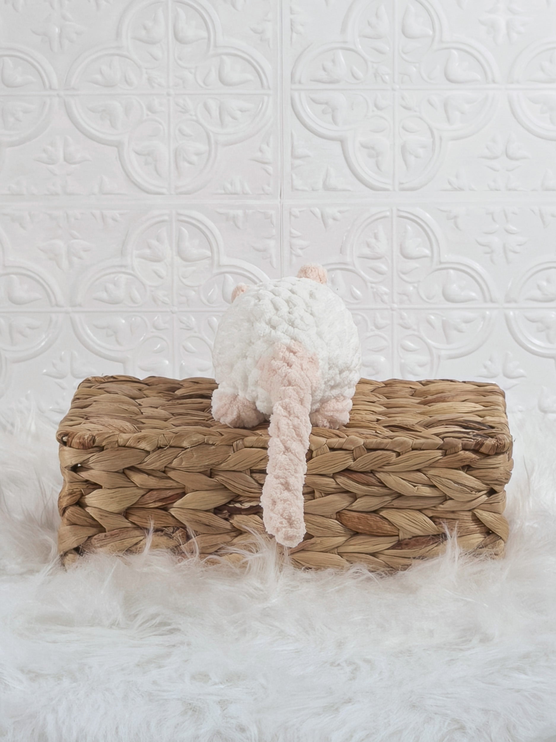 Handmade white rat crochet plushie shown from the back