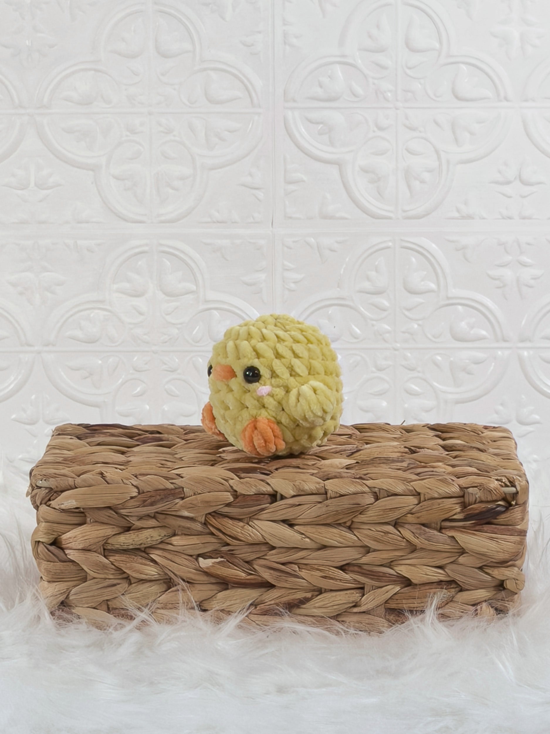 Handmade baby chick crochet plushie shown from the front