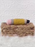 Handmade pencil crochet plushie with a colourful school-inspired design