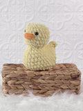 Handmade rubber duck crochet plushie shown from the front
